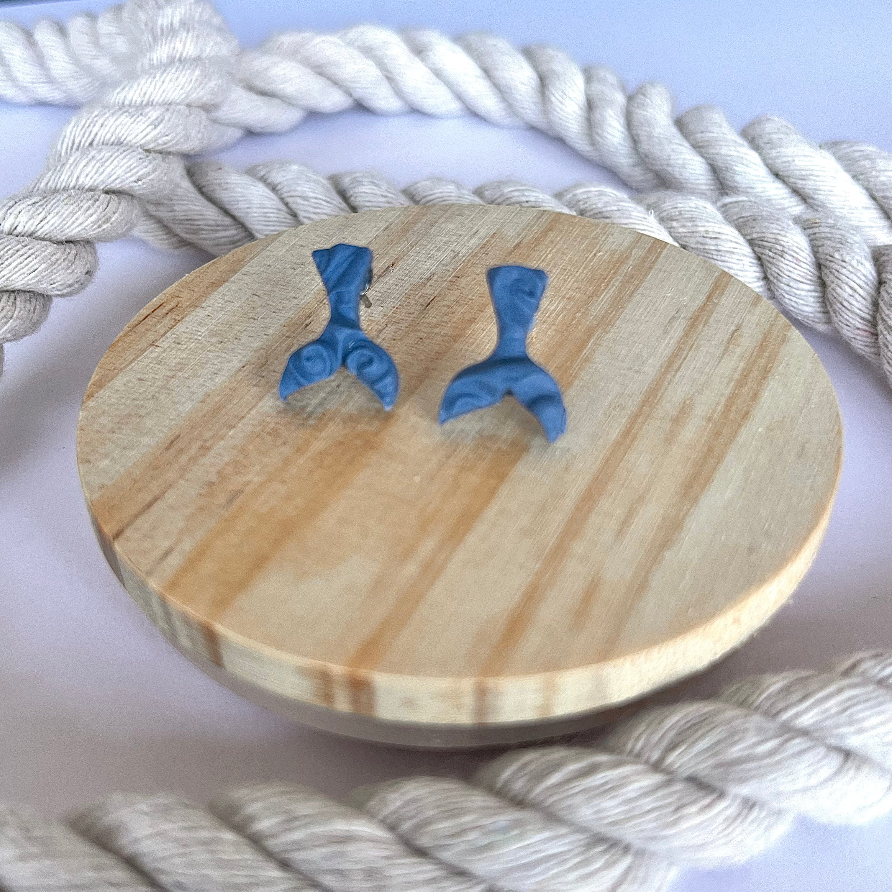 Whale tail studs